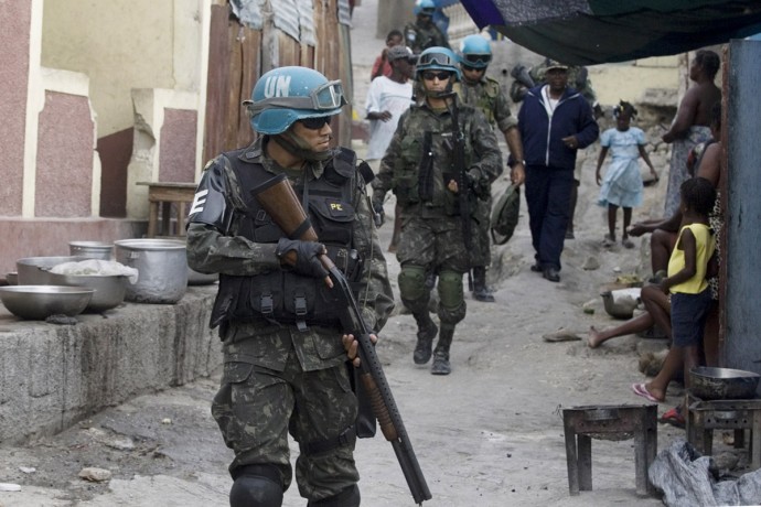 Members of the United Nations Stabilization Mission in Haiti patrolling Citè Soleil, Port-au-Prince  - © Giulio Napolitano