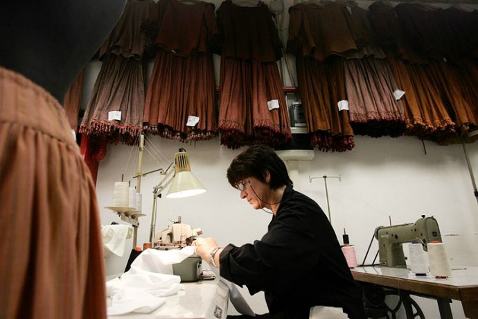 Dressmaker at work before the Opening show  - © Giulio Napolitano