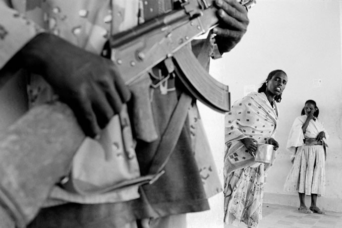 An Eritrean soldier stands inside an hospital in the southern town of Senafè, 2001